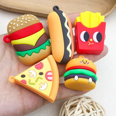 Yellow cake charms arranged on a light background