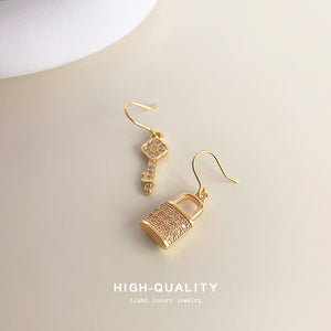 Gold Asymmetric Key Lock Drop Earrings Clear CZ Pave