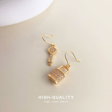 Gold Asymmetric Key Lock Drop Earrings Clear CZ Pave