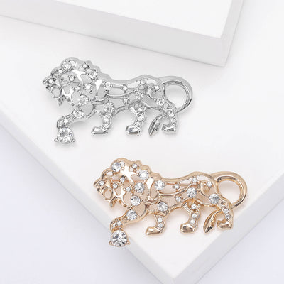 Front product view of the crystal tiger brooch on a light background