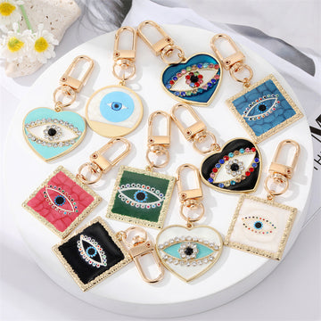 Gold Tone Square Heart and Round Evil Eye Clip Keychains