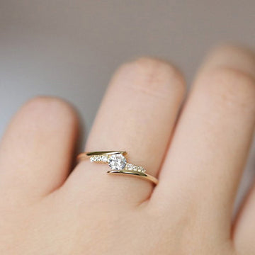 Gold Crossed Band Clear Center Stone Ring Metal Alloy