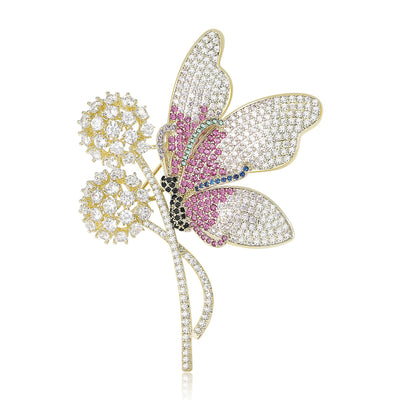 Multicolor pink pavé butterfly dandelion brooch front on white