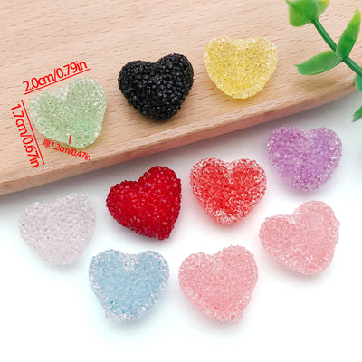 Front product photo of translucent gummy heart acrylic bead showing the pictured design arrangement