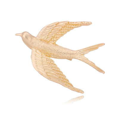 Front product view of an 18k gold bird brooch