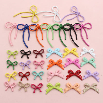 Colorful Enamel Bow Charms in Three Sizes and Mixed Colors shown in a grouped front view
