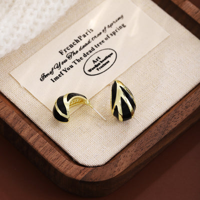 Primary supplied view of zebra teardrop earrings