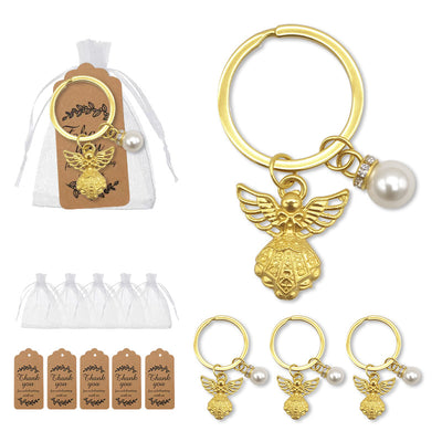 Gold angel pearl keychains with white organza bags and kraft tags