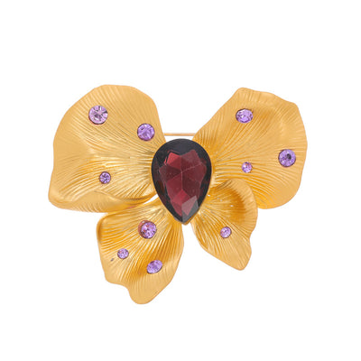 Front product view of the ribbon bow brooch pin in gold and red