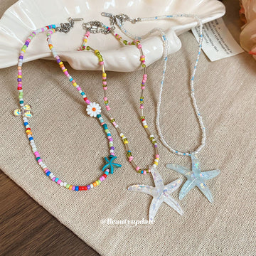 Rainbow Seed Bead Choker And Glitter Starfish Necklace