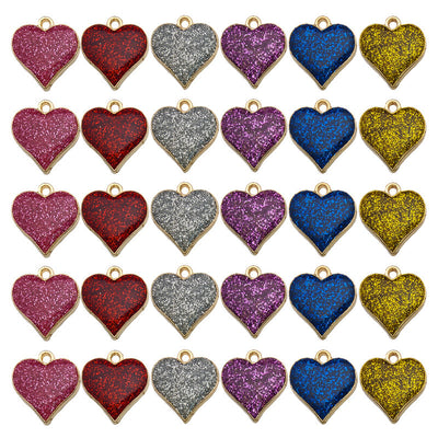 Colorful heart charms arranged on a light background