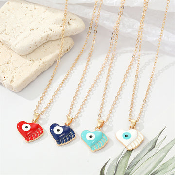 Gold Tone Winged Heart Evil Eye Pendant Necklaces