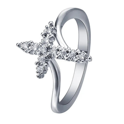 White metal clear zircon cross ring on white background