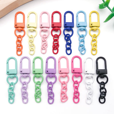 Colorful jewelry chain jewelry findings arranged on a light background