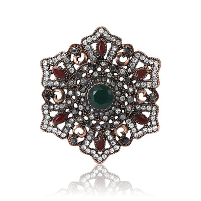 Product image 1 showing the ornate floral medallion brooch with deep green center.
