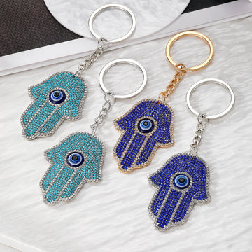Blue Hamsa Eye Keychains in Gold and Silver Tones