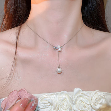 Silver Geometric Pearl Drop Necklace With A Silver-Tone Finish