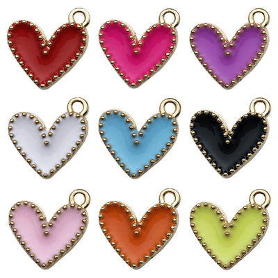 Colorful heart charms arranged on a light background
