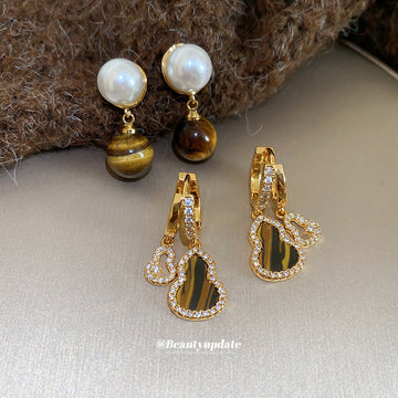 Pearl and Brown Stone Shell Drop Earrings in Gold Tone