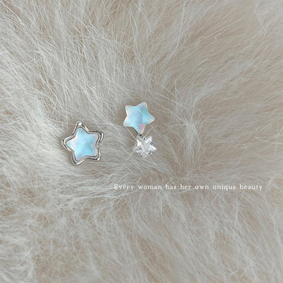 Silver-tone pale-blue star asymmetric studs in the first product display.