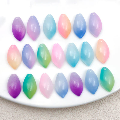 Colorful lotus charms arranged on a light background