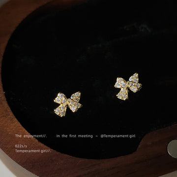 Gold Mini Bow Stud Earrings with Clear Stone Accents