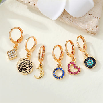 Gold Tone Crystal Charm Huggie Earrings in Six Designs and One Set