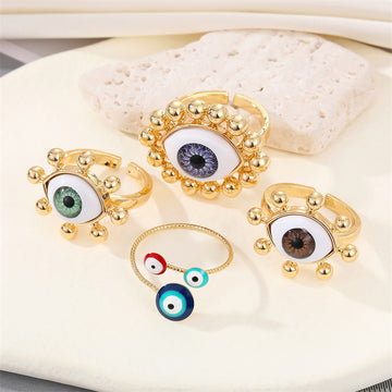 Gold Tone Realistic Eyeball Adjustable Rings and Three-Eye Cuff Bracelet