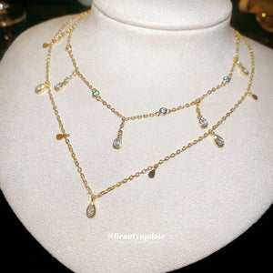 Gold Tone Layered Station Necklace with Teardrop Charms