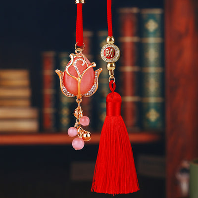 A front product view shows the mixed floral car hanger with its visible ornament and hanging hardware.
