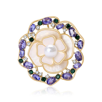 Front view of round shell flower framed by purple and blue crystals