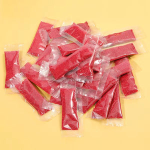 Red Granular Sand Filling in Individual Clear Plastic Packets