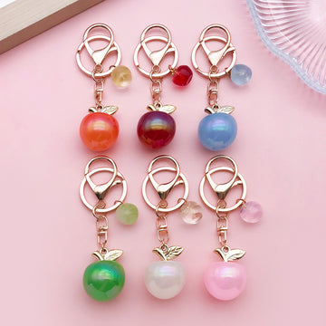 Apple Charm Keychains Featuring Pink Apple Across 52 Pictured Variations