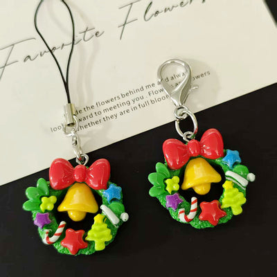 Christmas wreath resin charms with phone strap and lobster clasp side by side