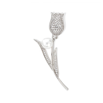 Front view of the silver tulip metal brooch