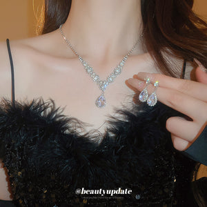 Silver Tone Round Crystal Cluster Necklace And Iridescent Teardrop Earrings