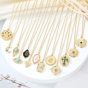 Gold-Tone Medallion Pendant Necklaces with Eye, Cross and Moon Designs