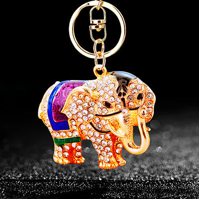 Main image 1 shows the Purple Ornate-Elephant option with its visible attached key hardware.
