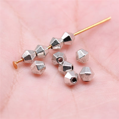 Hand held view of cube beads