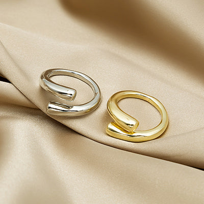 Primary supplied view of folded silver open ring