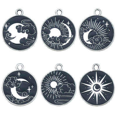 Colorful moon and sun charms arranged on a light background