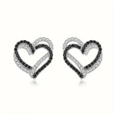 Silver open heart studs with black and clear CZ on white