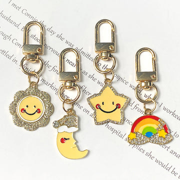 Gold Tone Rainbow Star Moon and Sun Clip Keychains