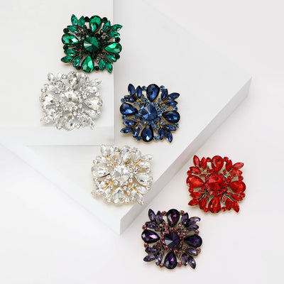 Front view of round flower cluster with layered marquise and round crystal petals