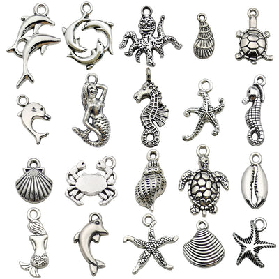 Metallic seahorse and turtle charms pictured with visible surface details