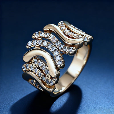 Product view showing wide curved clear-stone statement ring