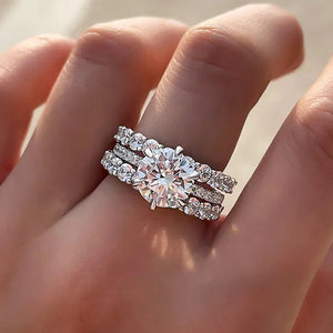 Round Solitaire And Marquise Three-Ring Set In Silver Tone