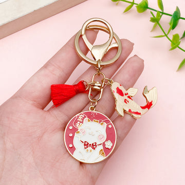 Cat Charm Keychains Featuring Red Blossom Across 17 Pictured Variations