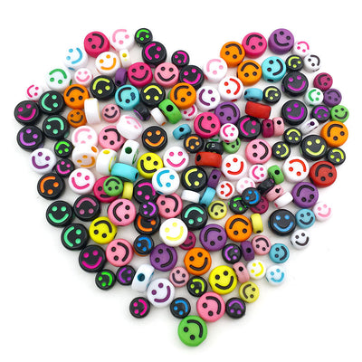 Colorful insect beads arranged on a light background