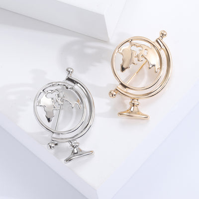 rotating globe brooch shown in the main product arrangement